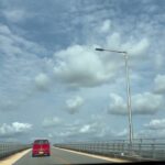 2023年 沖縄県宮古島市宮古島から無料で3540メートルの長さがある伊良部大橋を渡り伊良部島に移動する風景　Irabu Ohashi Bridge in Miyakojima Island Okinawa